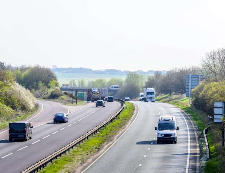 Fleet tracking vehicles on a motorway.